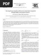 Gas-Liquid Mass Transfer Coefficient in Stirred Tanks Interpreted