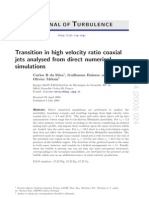 Transition in High Velocity Ratio Coaxial Jets Analysed From Direct Numerical Simulations