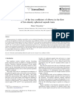 Determination of The Loss Coefficient of Elbows in The Flow of Low-Density Spherical Capsule Train