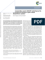 Photoreversible current ON/OFF switching by the photoinduced bending of gold-coated diarylethene crystals