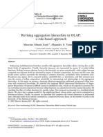 Revising Aggregation Hierarchies in OLAP-- A Rule-based Approach