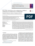 Heat Transfer Characteristics of The Oscillating Flows of Different Working Gases in U-Shaped Tubes of A Stirling Engine