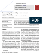 Beam Combining of Lasers With High Spectral Density Using Volume Bragg Gratings