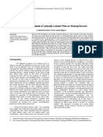 Finite Element Analysis of Laterally Loaded Piles on Sloping Ground