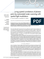 Measuring Spatial Correlations of Photon Pairs by Automated Raster Scanning With Spatial Light Modulators