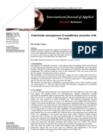 Endodontic management of mandibular premolar with two roots.pdf