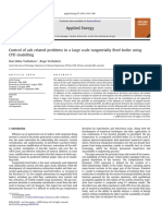 Control of Ash Related Problems in A Large Scale Tangentially Fired Boiler Using CFD Modelling