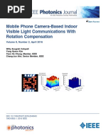 Mobile Phone Camera-Based Indoor Visible Light Communications With Rotation Compensation