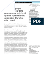 Acemannan sponges stimulate alveolar bone, cementum and periodontal ligament regeneration in a canine class II furcation defect model