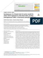Development of A Bicycle Level of Service Model For Urban Street Segments in Mid-Sized Cities Carrying Heterogeneous Traffic: A Functional Networks Approach