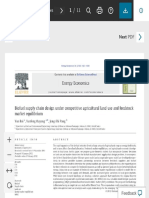 Biofuel Supply Chain Design Under Competitive Agricultural Land Use and Feedstock Market Equilibrium