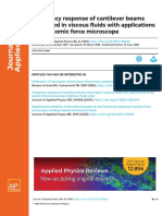 Frequency Response of Cantilever Beams Immersed in Viscous Fluids With Applications To The Atomic Force Microscope