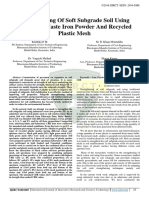 Strengthening of Soft Subgrade Soil Using Ind Waste Iron Powder and Recycled Plastic Mesh