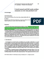 Comparisons of Wind-Tunnel and Full-Scale Surface Pressure Measurements On Low-Rise Pitched-Roof Buildings