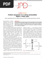 Prosthetic Management of An Existing Transmandibular Implant: A Clinical Report