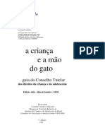 A Criança e A Mão Do Gato