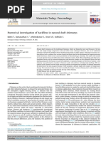 Numerical investigation of backflow in natural draft chimneys