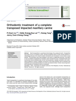 Orthodontic Treatment of A Complete Transposed Impacted Maxillary Canine