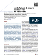 Metformin Retards Aging in C. Elegans by Altering Microbial Folate and Methionine Metabolism