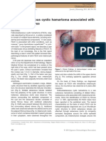 Folliculosebaceous Cystic Hamartoma Associated With Melanocytic Nevus