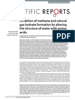 Inhibition of Methane and Natural Gas Hydrate Formation by Altering The Structure of Water With Amino Acids