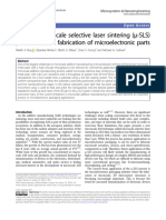 A novel microscale selective laser sintering (μ-SLS) process for the fabrication of microelectronic parts