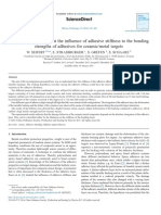 Experimental Study About The Influence of Adhesive Stiffness To The Bonding Strengths of Adhesives For Ceramic - Metal Targets