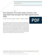 Non-Hysteretic First-Order Phase Transition With Large Latent Heat and Giant Low-Field Magnetocaloric Effect