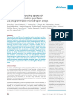 A Molecular Computing Approach To Solving Optimization Problems Via Programmable Microdroplet Arrays