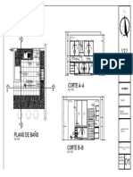 Cocina blanca con muebles gris y grifería dorada