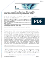 Primary Instability of A Shear-Thinning Film Flow Down An Incline: Experimental Study