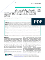 Accuracy of in Vitro Mandibular Volumetric Measurements From CBCT of Different Voxel Sizes With Different Segmentation Threshold Settings