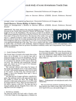 Experimental and Numerical Study of Scour Downstream Toachi Dam