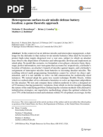 Heterogeneous Surface-To-Air Missile Defense Battery Location: A Game Theoretic Approach