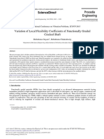 Variation of Local Flexibility Coefficients of Functionally Graded Cracked Shaft