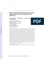 Review of Glass Fiber Grid Use For Pavement Reinforcement and APT Experiments at Ifsttar