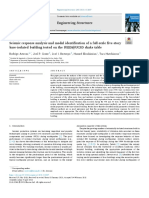 Seismic Response Analysis and Modal Identification of A Full-Scale Five-Story Base-Isolated Building Tested On The NEES@UCSD Shake Table