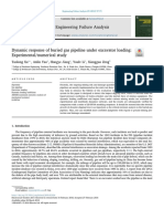 Dynamic Response of Buried Gas Pipeline Under Excavator Loading - Experimental - Numerical Study