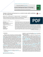 Analysis of lateral earth pressure on a vertical circular shaft considering