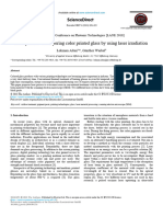 New Process of Tempering Color Printed Glass by Using Laser Irradiation