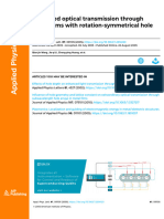 Enhanced Optical Transmission Through Metal Films With Rotation-Symmetrical Hole Arrays