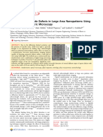 Detecting 20 nm Wide Defects in Large Area Nanopatterns Using Optical Interferometric Microscopy