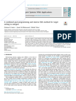 A Combined Goal Programming and Inverse DEA Method For Target Setting in Mergers