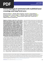 Chiral Topological Semimetal With Multifold Band Crossings and Long Fermi Arcs