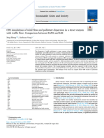 CFD Simulations of Wind Flow and Pollutant Dispersion Comparison Between RANS and LES