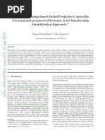 Adaptive Learning-Based Model Predictive Control For Uncertain Interconnected Systems: A Set Membership Identification Approach