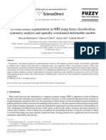 3D Brain Tumor Segmentation in MRI Using Fuzzy Classification, Symmetry Analysis and Spatially Constrained Deformable Models