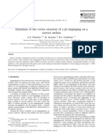 Dynamic of the Vortex Structure of a Jet Impinging on a Convex Surface